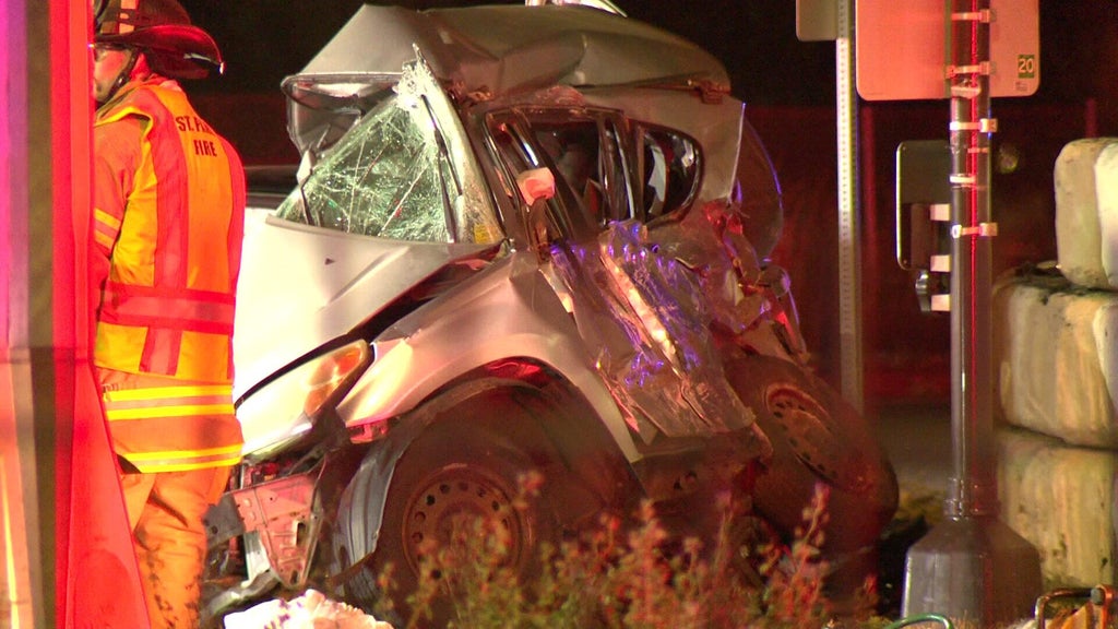 A Tesla and a Toyota RAV4 involved in a high-speed crash on a St. Paul road at night.